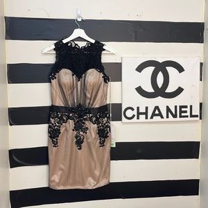 Short cocktail dress for any occasion. Brown with black tulle and lace trim.